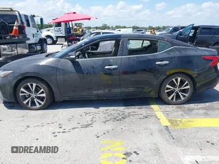 2019 Nissan Maxima Platinum z VIN 1N4AA6AV8KC366407, wystawiony jako IAAI lot #42329455 z przebiegiem 34 518 mil mil oraz . Historia ofert i sprzedaży dostępna na DreamBid. Obrazek 14.