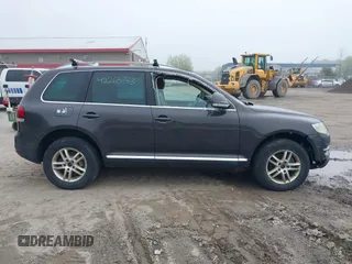 2008 Volkswagen Touareg V6 z VIN WVGBE77L98D001375, wystawiony jako IAAI lot #42265733 z przebiegiem 201 217 mil mil oraz . Historia ofert i sprzedaży dostępna na DreamBid. Obrazek 14.