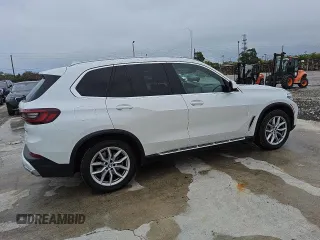 2023 BMW X5 xDrive40i z VIN 5UXCR6C08P9P32642, wystawiony jako Copart lot #56059525 z przebiegiem 48 802 mil mil oraz Czysty tytuł • Clean title. Historia ofert i sprzedaży dostępna na DreamBid. Obrazek 3.