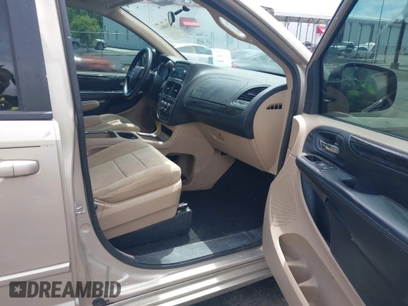 2014 Dodge Grand Caravan SXT z VIN 2C4RDGCG1ER182396, wystawiony jako IAAI lot #42148810 z przebiegiem 121 056 mil mil oraz . Historia ofert i sprzedaży dostępna na DreamBid. Obrazek 5.