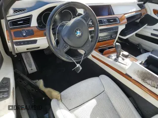 2015 BMW 7 Series 750Li xDrive with VIN WBAYF8C58FD654184, listed as a Copart auction lot 77203184 with 122,955 mi miles and Non Repairable. Bid and sale history available at DreamBid. Image 8.