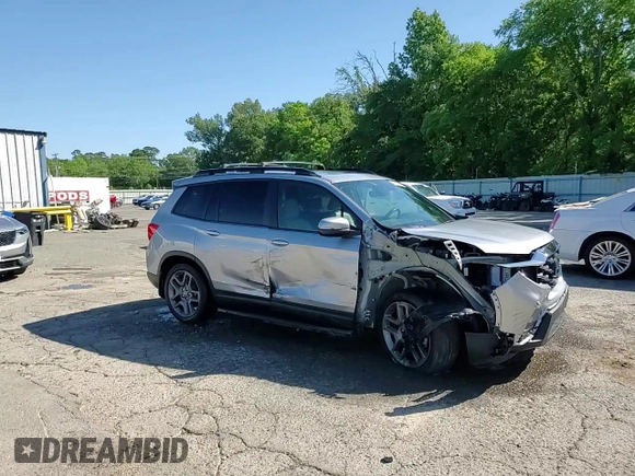 2022 Honda Passport EX-L z VIN 5FNYF7H59NB003482, wystawiony jako Copart lot #55460425 z przebiegiem 32 321 mil mil oraz Szkoda całkowita • Salvage title. Historia ofert i sprzedaży dostępna na DreamBid. Obrazek 14.