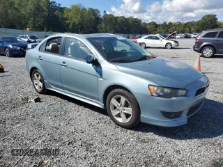 2009 Mitsubishi Lancer ES with VIN JA3AU26U89U019138, listed as a Copart auction lot 74227264 with 223,351 mi miles and Salvage Title. Bid and sale history available at DreamBid. Image 4.