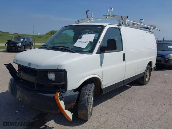 2011 Chevrolet Express Cargo Van with VIN 1GCWGFBA2B1105523, listed as a IAAI auction lot 39967800 with 208,682 mi miles. Bid and sale history available at carsss.com. Image 2.