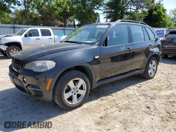 2012 BMW X5 35i z VIN 5UXZV4C52CL748838, wystawiony jako Copart lot #58051155 z przebiegiem 224 088 mil mil oraz Czysty tytuł • Clean title. Historia ofert i sprzedaży dostępna na DreamBid. Obrazek 1.