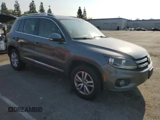 2013 Volkswagen Tiguan SE z VIN WVGAV7AX2DW023093, wystawiony jako Copart lot #64694405 z przebiegiem 137 460 mil mil oraz Szkoda całkowita • Salvage title. Historia ofert i sprzedaży dostępna na DreamBid. Obrazek 4.