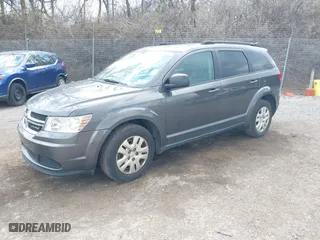 2017 Dodge Journey SE with VIN 3C4PDCAB2HT696945, listed as a IAAI auction lot 41884951 with NaN miles. Bid and sale history available at carsss.com. Image 18.