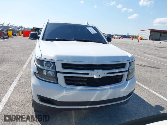 2015 Chevrolet Tahoe LT with VIN 1GNSCBKCXFR552071, listed as a IAAI auction lot 41972157 with 214,738 mi miles and . Bid and sale history available at DreamBid. Image 12.