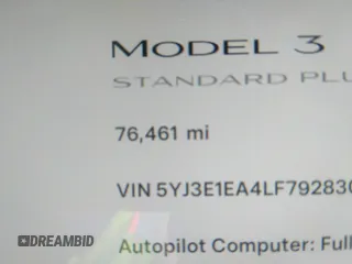 2020 Tesla Model 3 Standard Range Plus with VIN 5YJ3E1EA4LF792830, listed as a IAAI auction lot 41852919 with 76,461 mi miles. Bid and sale history available at carsss.com. Image 7.