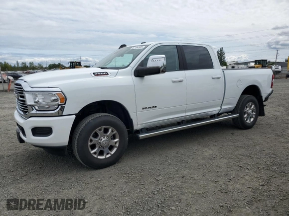 2023 Ram 2500 Laramie with VIN 3C6UR5FJ1PG634158, listed as a Copart auction lot 57164505 with 18,279 mi miles and Salvage title. Bid and sale history available at DreamBid. Image 1.