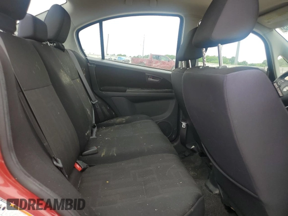 2012 Suzuki SX4 LE z VIN JS2YC5A33C6304897, wystawiony jako Copart lot #55567505 z przebiegiem 42 968 mil mil oraz Szkoda całkowita • Salvage title. Historia ofert i sprzedaży dostępna na DreamBid. Obrazek 10.