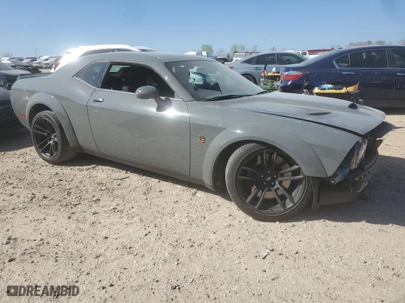 2023 Dodge Challenger R/T Scat Pack with VIN 2C3CDZFJ5PH678968, listed as a Copart auction lot 48384995 with 9,802 mi miles and Salvage Title. Bid and sale history available at carsss.com. Image 4.