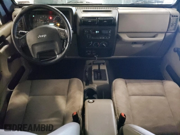 2005 Jeep Wrangler Sport with VIN 1J4FA49S35P341517, listed as a Copart auction lot 65224645 with 153,832 mi miles and Clean title. Bid and sale history available at DreamBid. Image 8.
