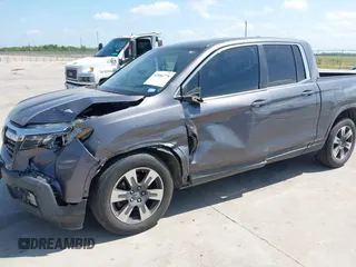 2019 Honda Ridgeline RTL with VIN 5FPYK2F59KB004653, listed as a IAAI auction lot 42066778 with 90,144 mi miles and . Bid and sale history available at DreamBid. Image 6.