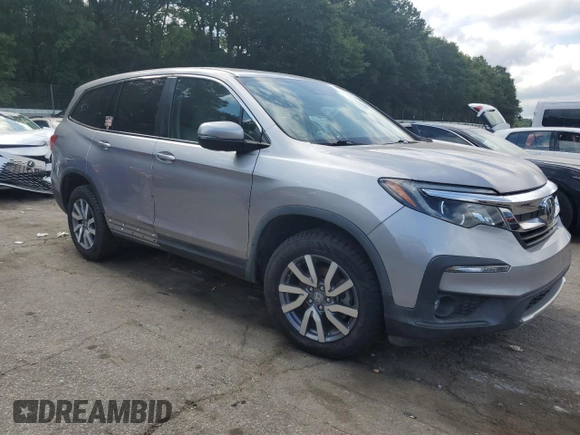 2022 Honda Pilot EX-L with VIN 5FNYF6H55NB000895, listed as a Copart auction lot 64764535 with 150,157 mi miles and Clean title. Bid and sale history available at DreamBid. Image 4.