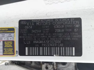 2015 Kia Optima LX with VIN KNAGM4A70F5571034, listed as a IAAI auction lot 41734211 with 214,948 mi miles. Bid and sale history available at carsss.com. Image 9.