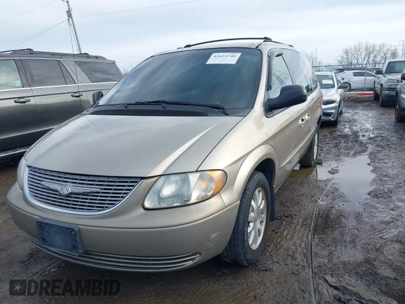 2002 Chrysler Town & Country EX with VIN 2C8GP74L62R524896, listed as a IAAI auction lot 41651240 with 128,983 mi miles and . Bid and sale history available at carsss.com. Image 2.