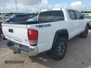 2018 Toyota Tacoma SR with VIN 3TMCZ5AN6JM138747, listed as a IAAI auction lot 42684725 with 144,725 mi miles and . Bid and sale history available at DreamBid. Image 4.