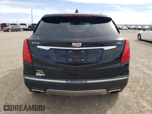 2017 Cadillac XT5 Platinum AWD z VIN 1GYKNFRS1HZ283589, wystawiony jako Copart lot #49140565 z przebiegiem 77 900 mil mil oraz Szkoda całkowita • Salvage title. Historia ofert i sprzedaży dostępna na DreamBid. Obrazek 6.