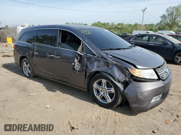 2012 Honda Odyssey Touring with VIN 5FNRL5H92CB134917, listed as a Copart auction lot 54437875 with 139,318 mi miles and Salvage Title. Bid and sale history available at DreamBid. Image 4.