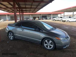 2008 Honda Civic Cpe EX-L with VIN 2HGFG12998H552158, listed as a IAAI auction lot 41636985 with 143,337 mi miles. Bid and sale history available at carsss.com. Image 13.