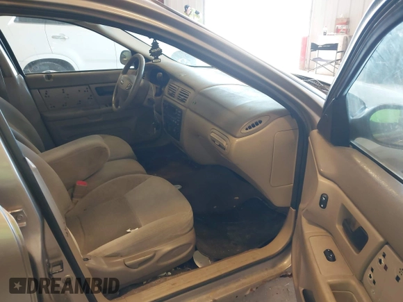 2003 Ford Taurus SES Standard with VIN 1FAFP55293G272187, listed as a IAAI auction lot 42154599 with 225,077 mi miles. Bid and sale history available at carsss.com. Image 5.