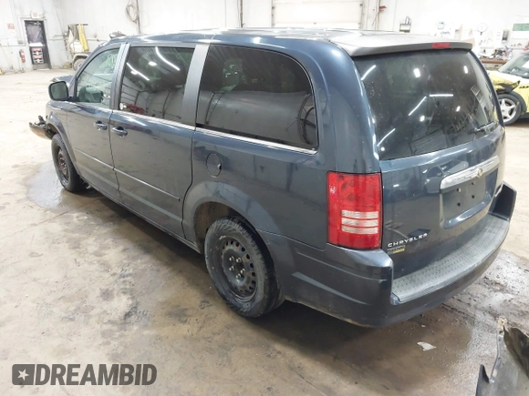 2009 Chrysler Town & Country LX with VIN 2A8HR44E79R597925, listed as a IAAI auction lot 42039180 with 226,138 mi miles. Bid and sale history available at carsss.com. Image 3.
