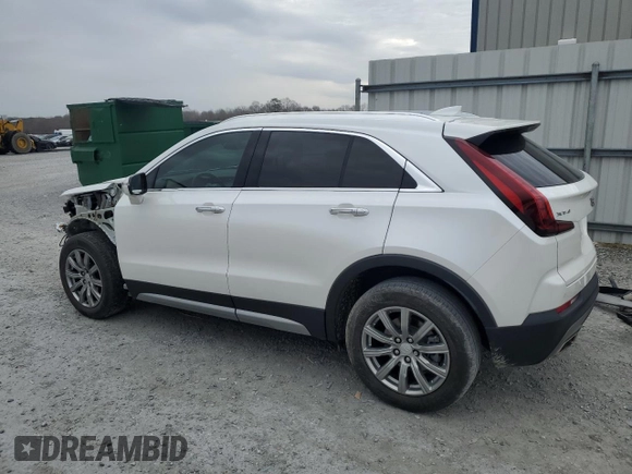 2021 Cadillac XT4 FWD Premium Luxury with VIN 1GYFZCR43MF032297, listed as a Copart auction lot 47379085 with 36,065 mi miles and Salvage Title. Bid and sale history available at DreamBid. Image 2.
