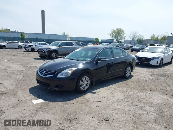 2011 Nissan Altima 2.5 S with VIN 1N4AL2AP5BN516577, listed as a IAAI auction lot 42112826 with 98,512 mi miles. Bid and sale history available at carsss.com. Image 2.