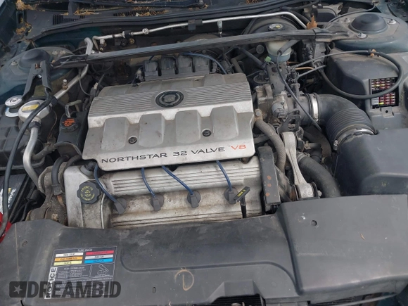 1999 Cadillac DeVille DHS z VIN 1G6KE54Y9XU766791, wystawiony jako IAAI lot #42005553 z przebiegiem 140 515 mil mil oraz . Historia ofert i sprzedaży dostępna na DreamBid. Obrazek 10.