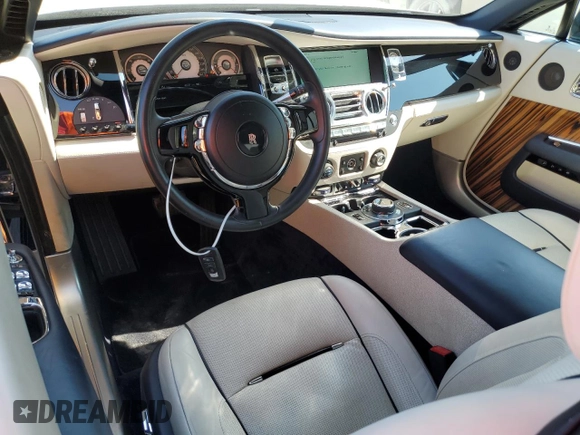 2014 Rolls-Royce Wraith z VIN SCA665C58EUX84660, wystawiony jako Copart lot #76050444 z przebiegiem 46 271 mil mil oraz Szkody całkowita. Historia ofert i sprzedaży dostępna na DreamBid. Obrazek 8.