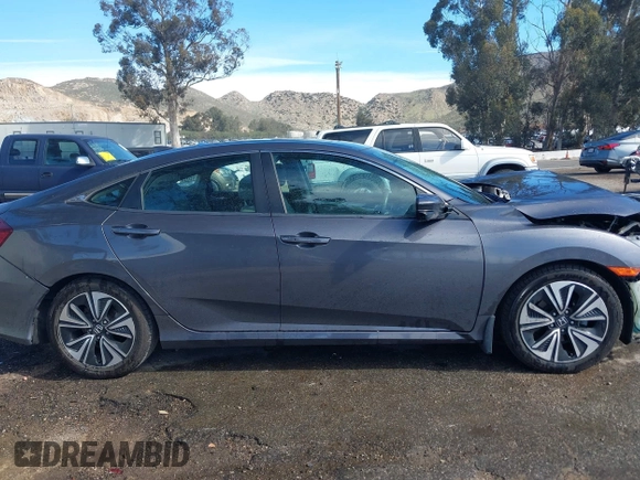 2017 Honda Civic EX-T with VIN 2HGFC1F33HH650782, listed as a IAAI auction lot 41685090 with 113,319 mi miles and . Bid and sale history available at carsss.com. Image 14.
