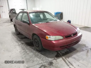 1999 Toyota Corolla VE z VIN 2T1BR18E2XC143357, wystawiony jako IAAI lot #41552102 z przebiegiem 287 049 mil mil oraz . Historia ofert i sprzedaży dostępna na DreamBid. Obrazek 1.