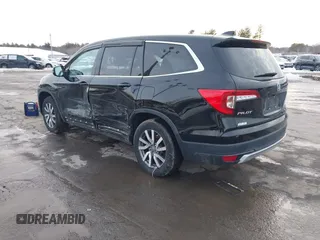 2020 Honda Pilot EX-L z VIN 5FNYF6H50LB022798, wystawiony jako IAAI lot #41592012 z przebiegiem 67 045 mil mil oraz . Historia ofert i sprzedaży dostępna na DreamBid. Obrazek 3.