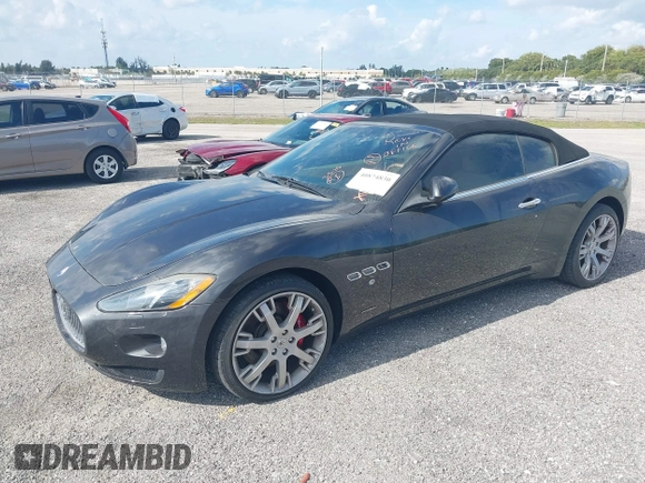 2013 Maserati GranTurismo Convertible Sport with VIN ZAM45MMA2D0069786, listed as a IAAI auction lot 40874830 with 37,312 mi miles. Bid and sale history available at carsss.com. Image 19.