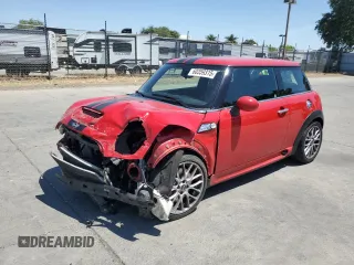 2013 MINI Hardtop John Cooper Works with VIN WMWSU9C57DT384871, listed as a Copart auction lot 60359315 with 111,962 mi miles and Salvage title. Bid and sale history available at DreamBid. Image 1.