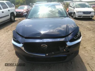 2022 Mazda CX-30 S Carbon Edition with VIN 3MVDMBCL6NM423255, listed as a IAAI auction lot 42209829 with 51,589 mi miles and . Bid and sale history available at DreamBid. Image 12.
