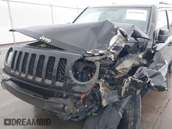2014 Jeep Patriot Sport with VIN 1C4NJRBBXED879285, listed as a IAAI auction lot 41944152 with 103,676 mi miles. Bid and sale history available at carsss.com. Image 6.