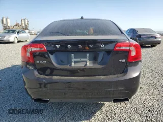 2015 Volvo S60 T5 Drive-E Premier z VIN YV126MFK6F2334600, wystawiony jako Copart lot #61436275 z przebiegiem 117 878 mil mil oraz Czysty tytuł • Clean title. Historia ofert i sprzedaży dostępna na DreamBid. Obrazek 6.