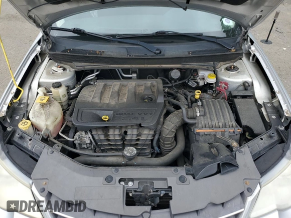 2010 Chrysler Sebring Touring z VIN 1C3CC4FB3AN203543, wystawiony jako Copart lot #57767985 z przebiegiem 152 951 mil mil oraz Szkoda całkowita • Salvage title. Historia ofert i sprzedaży dostępna na DreamBid. Obrazek 11.
