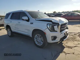 2022 GMC Yukon SLT with VIN 1GKS1BKD1NR259041, listed as a Copart auction lot 77877304 with 27,772 mi miles and Salvage Title. Bid and sale history available at carsss.com. Image 4.
