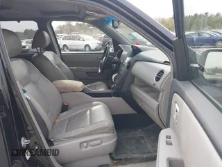 2009 Honda Pilot Touring with VIN 5FNYF48969B055806, listed as a IAAI auction lot 42138651 with 253,623 mi miles and . Bid and sale history available at carsss.com. Image 5.