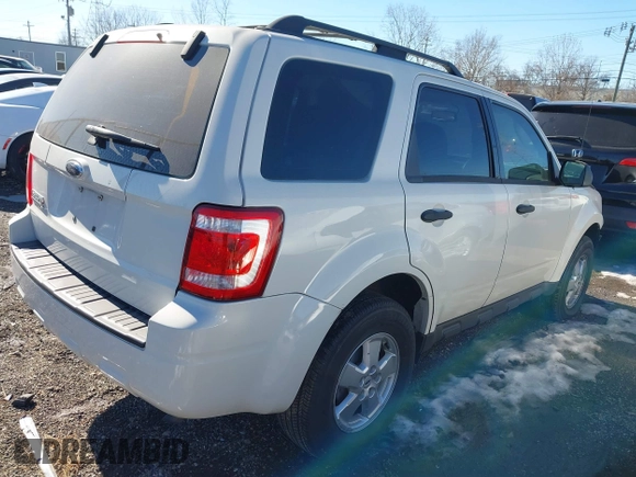 2009 Ford Escape XLS with VIN 1FMCU02729KA51377, listed as a IAAI auction lot 41404063 with 104,582 mi miles and . Bid and sale history available at DreamBid. Image 4.