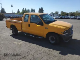 2002 Ford F-250 XL with VIN 1FTNX20L62EC53546, listed as a Copart auction lot 71931714 with 230,427 mi miles and Salvage title. Bid and sale history available at DreamBid. Image 4.