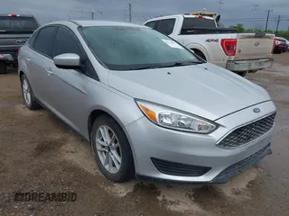 2018 Ford Focus SE with VIN 1FADP3FE5JL269490, listed as a IAAI auction lot 42116827 with 84,624 mi miles. Bid and sale history available at carsss.com. Image 1.