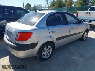 2008 Kia Rio LX with VIN KNADE123X86329097, listed as a IAAI auction lot 41822420 with 180,462 mi miles. Bid and sale history available at carsss.com. Image 4.