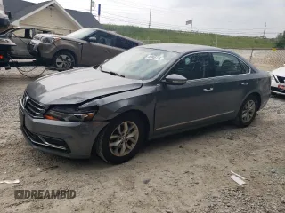 2016 Volkswagen Passat S with VIN 1VWAT7A3XGC058474, listed as a Copart auction lot 59945125 with 104,927 mi miles and Salvage title. Bid and sale history available at DreamBid. Image 1.
