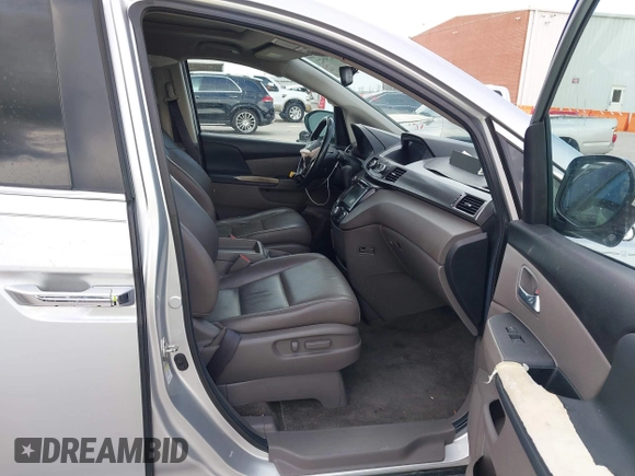 2014 Honda Odyssey EX-L with VIN 5FNRL5H60EB058753, listed as a IAAI auction lot 42595221 with 194,995 mi miles and . Bid and sale history available at DreamBid. Image 5.
