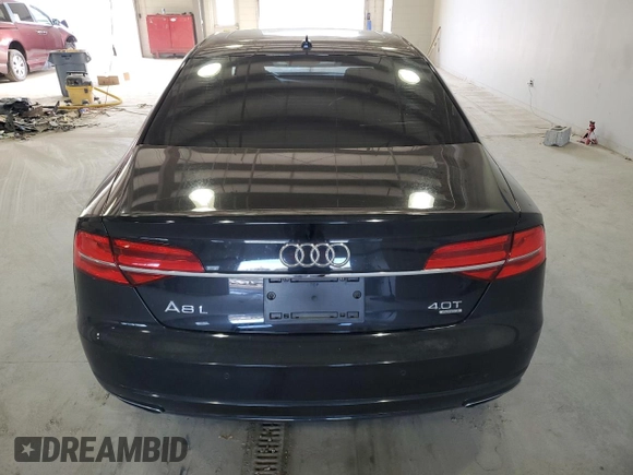 2016 Audi A8 Sport z VIN WAU43AFD1GN011589, wystawiony jako Copart lot #86614934 z przebiegiem 96 137 mil mil oraz Szkoda całkowita • Salvage title. Historia ofert i sprzedaży dostępna na DreamBid. Obrazek 6.
