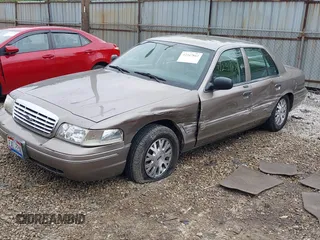 2004 Ford Crown Victoria LX z VIN 2FAFP74W74X114961, wystawiony jako IAAI lot #42347867 z przebiegiem 170 867 mil mil oraz . Historia ofert i sprzedaży dostępna na DreamBid. Obrazek 17.